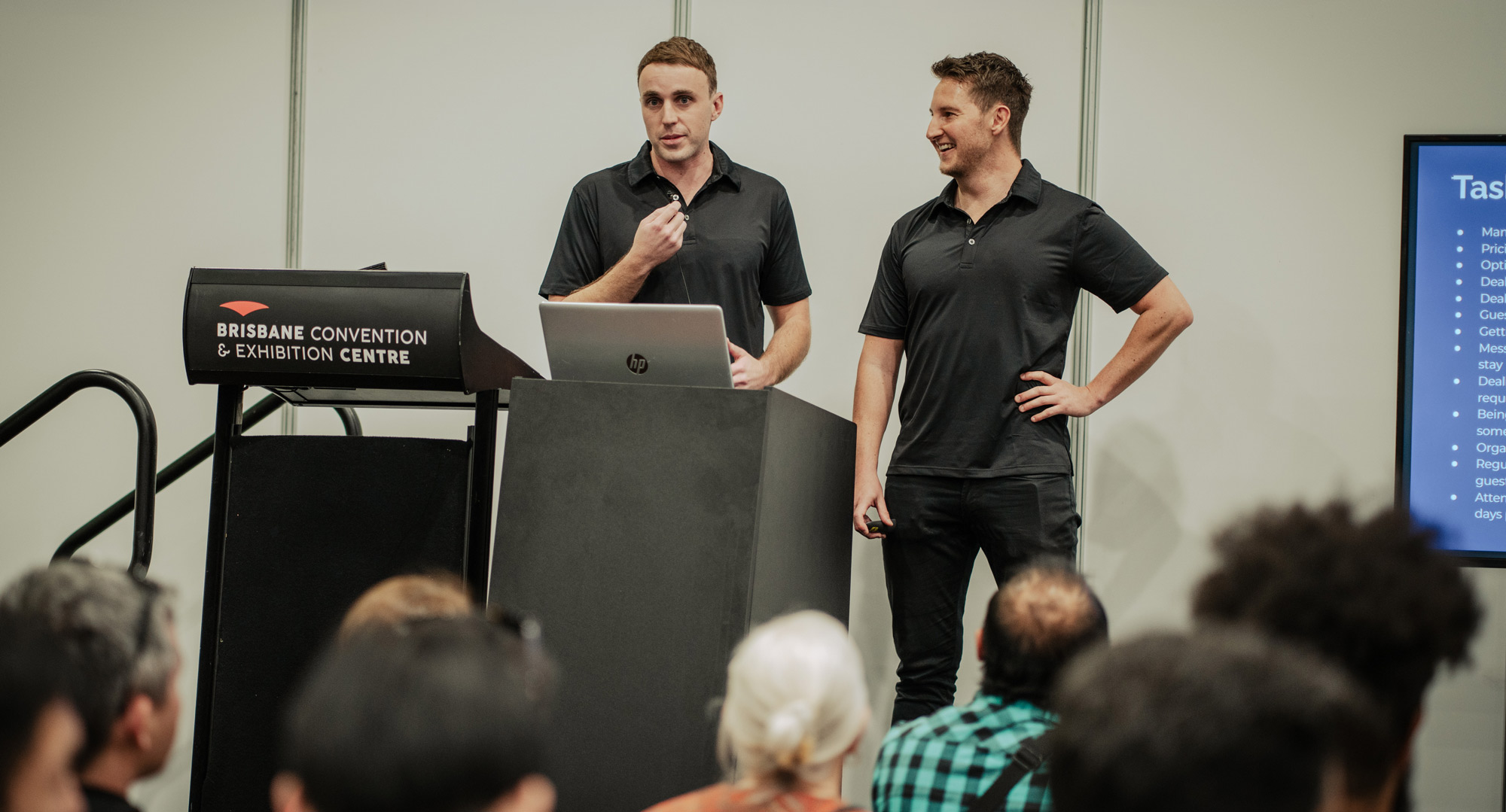Aaron-Nathan-Presenting-on-Stage-2 Aaron and Nathan Presenting